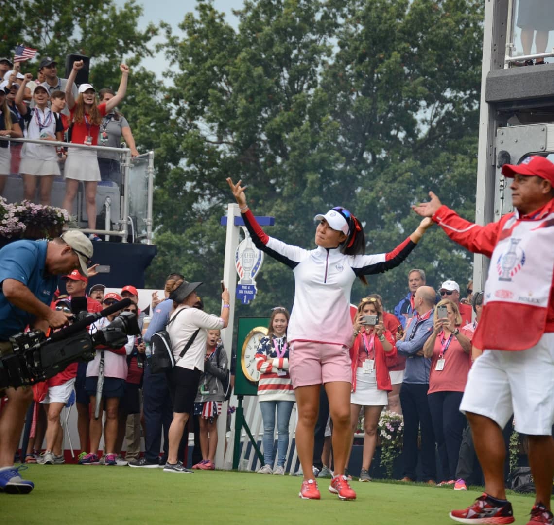 What Pressure? - Danielle Kang revs up the 2017 Solheim Cup crowd on the first-tee in Des Moines Iowa | Photo: Ben Harpring 